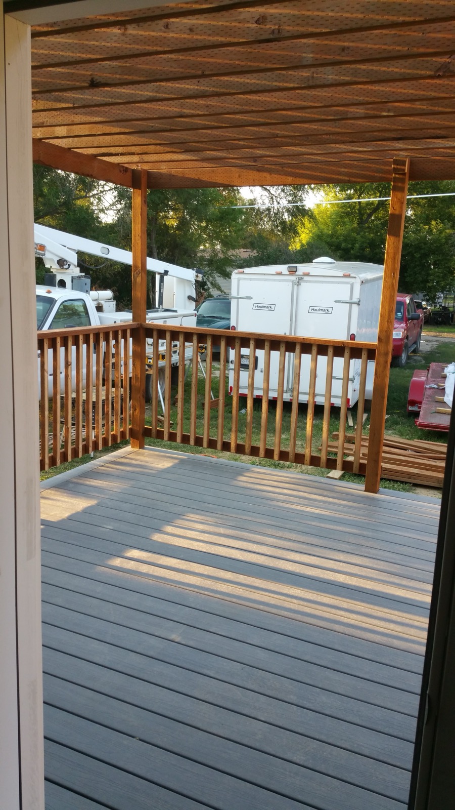 Composite deck with a cedar pergola