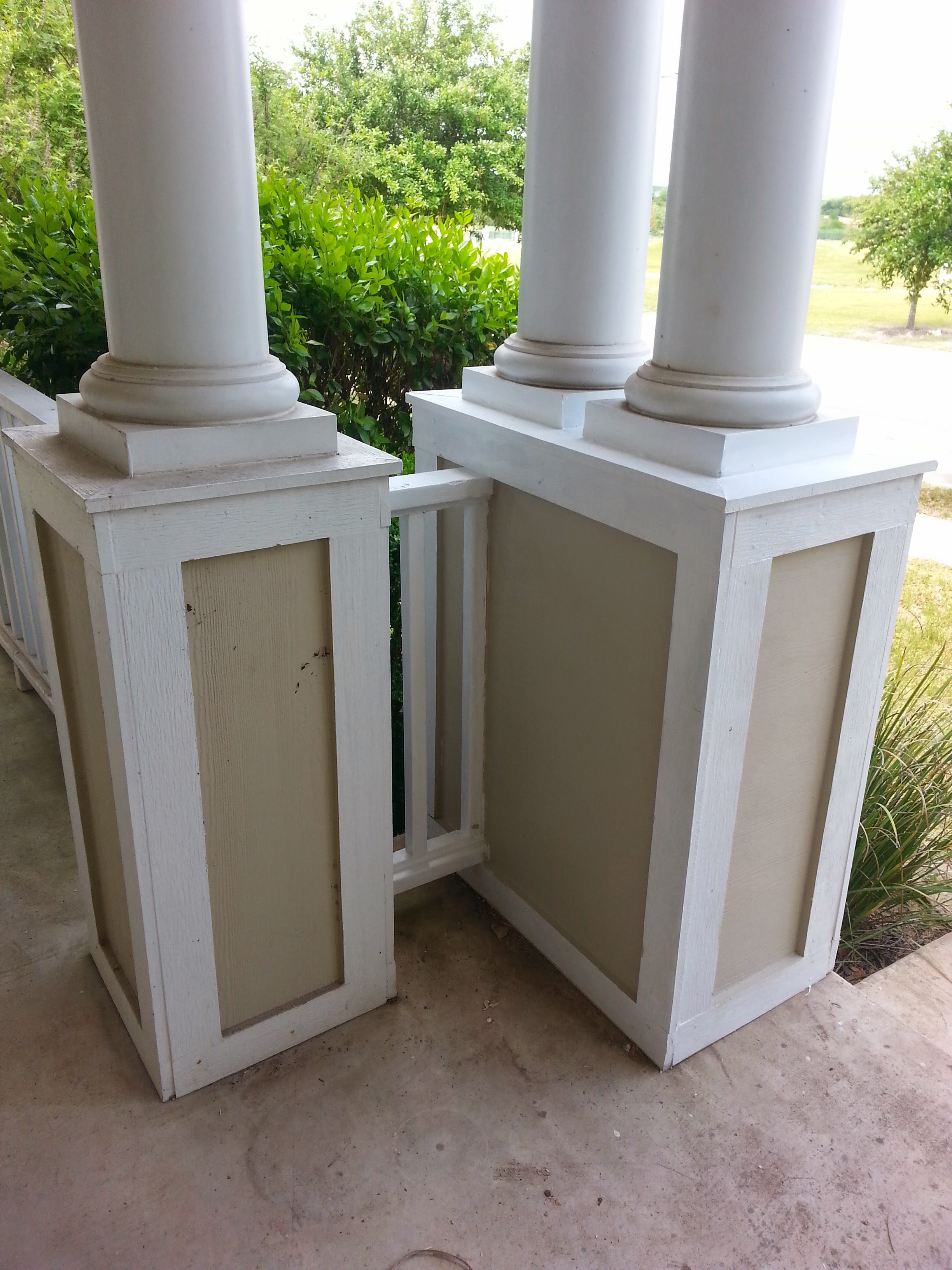 Freshly painted white column bases with clean cut lines